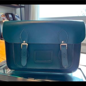 Cambridge Satchel Co. Crossbody bag. 14 inches in dark green.